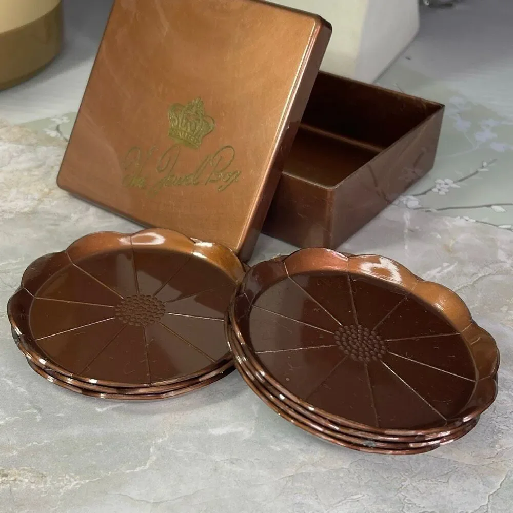 Vintage Midcentury Steeds The Jewel Box coaster set copper colored plastic.